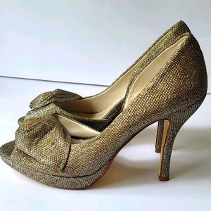 Caparros platform heels silver peep toe Rosette de